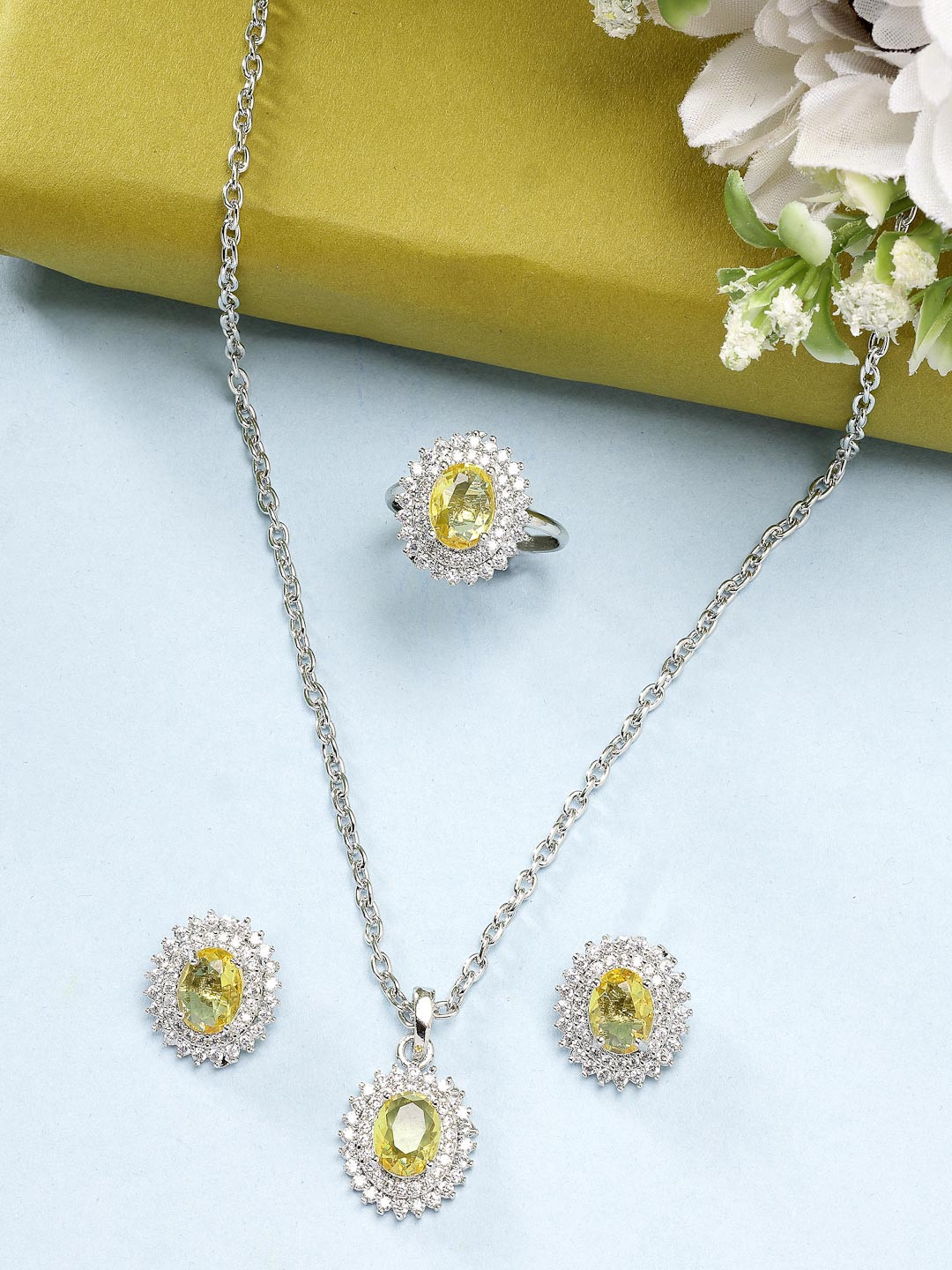 ZENEME Rhodium Plated Silver toned yellow AD Studded Pendant Set with Earrings & Ring