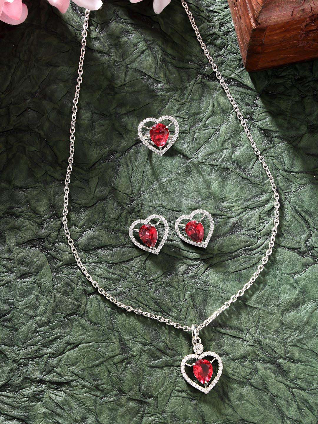 ZENEME Rhodium Plated Silver toned Heart Shaped Red AD Pendant set with Earrings & Ring