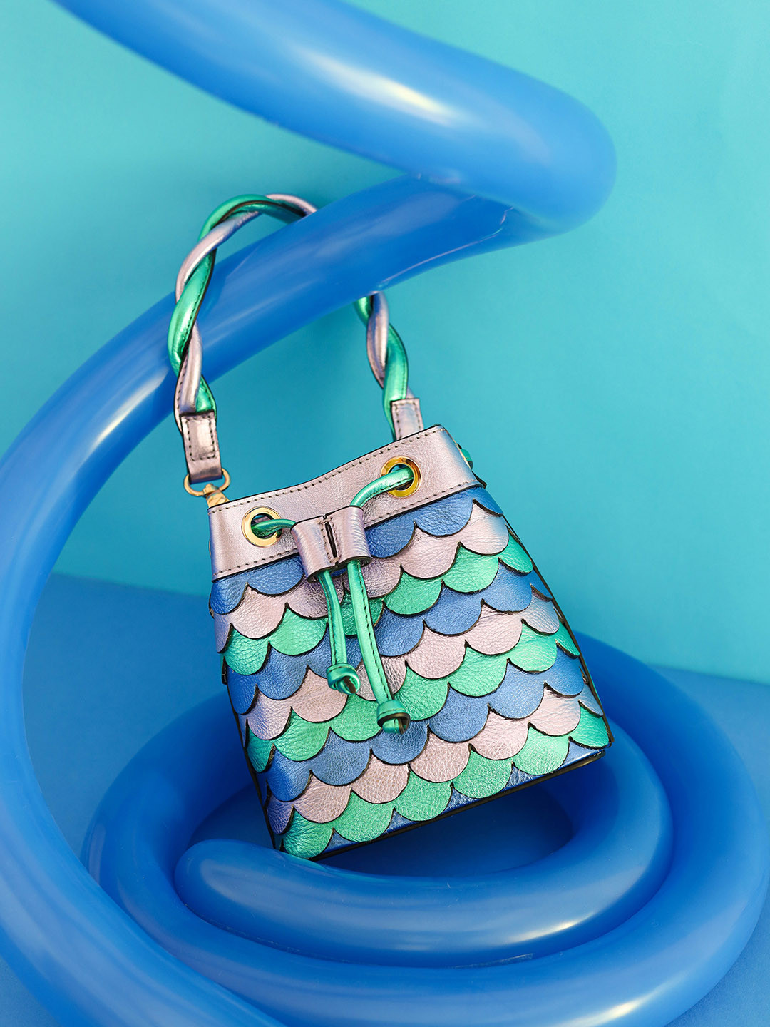 And Also Textured Leather Bucket Sling Bag