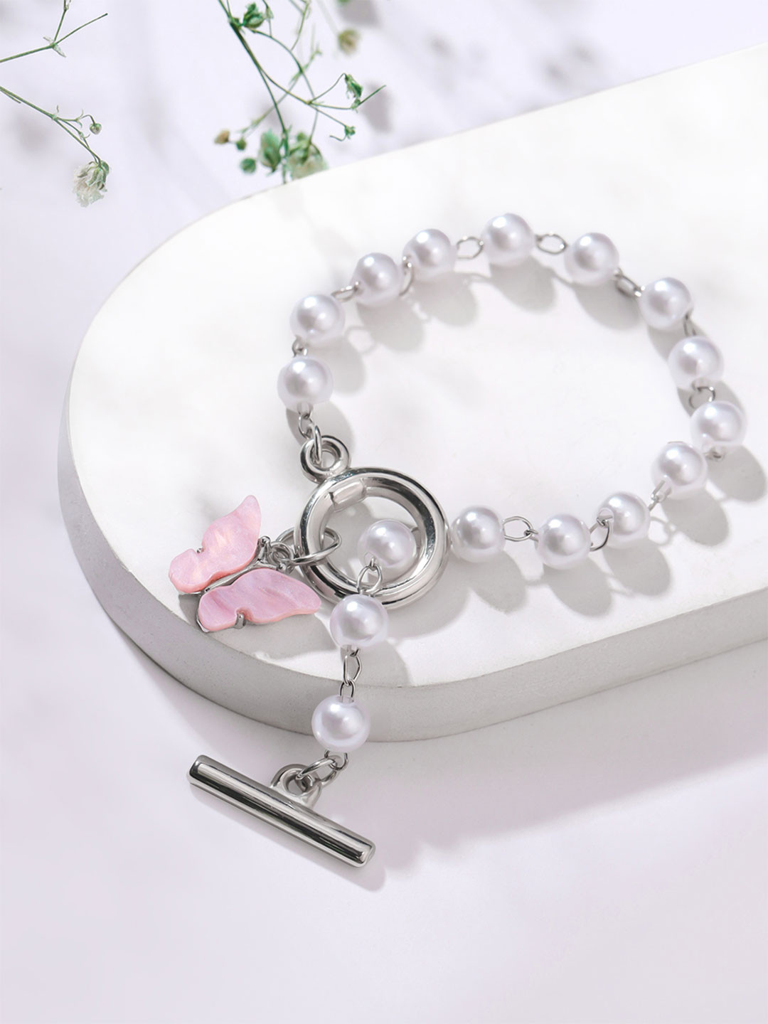 Yellow Chimes White Rhodium Plated Pearls Charm Bracelet