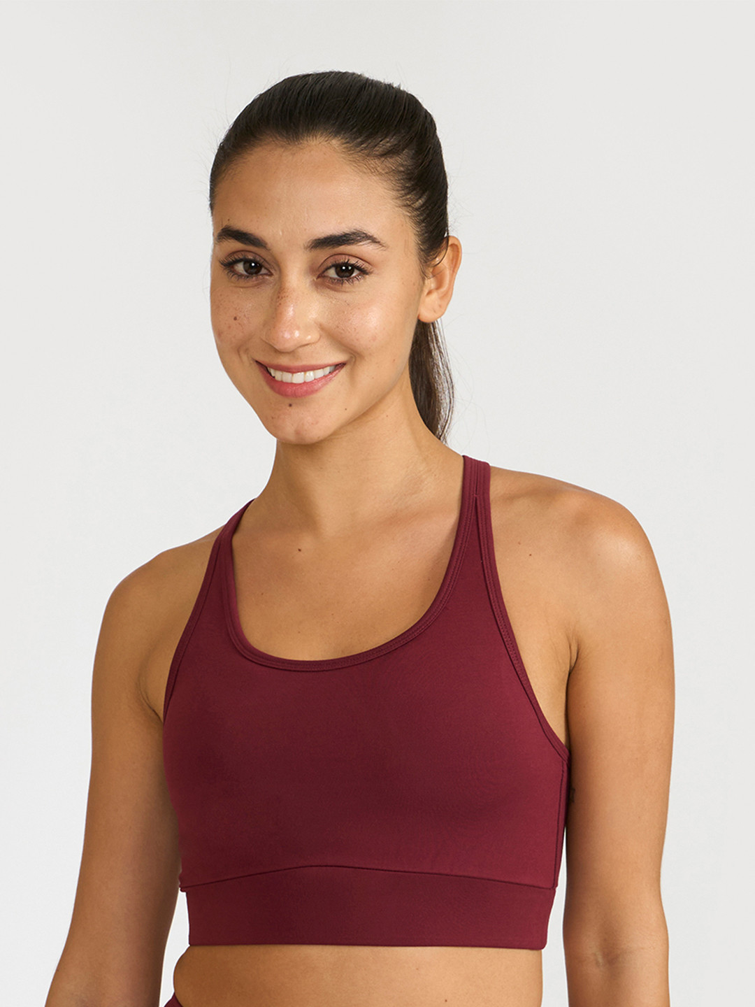 Hunnit Women Zen Cross Back Round Neck Sports Bra with Medium Coverage