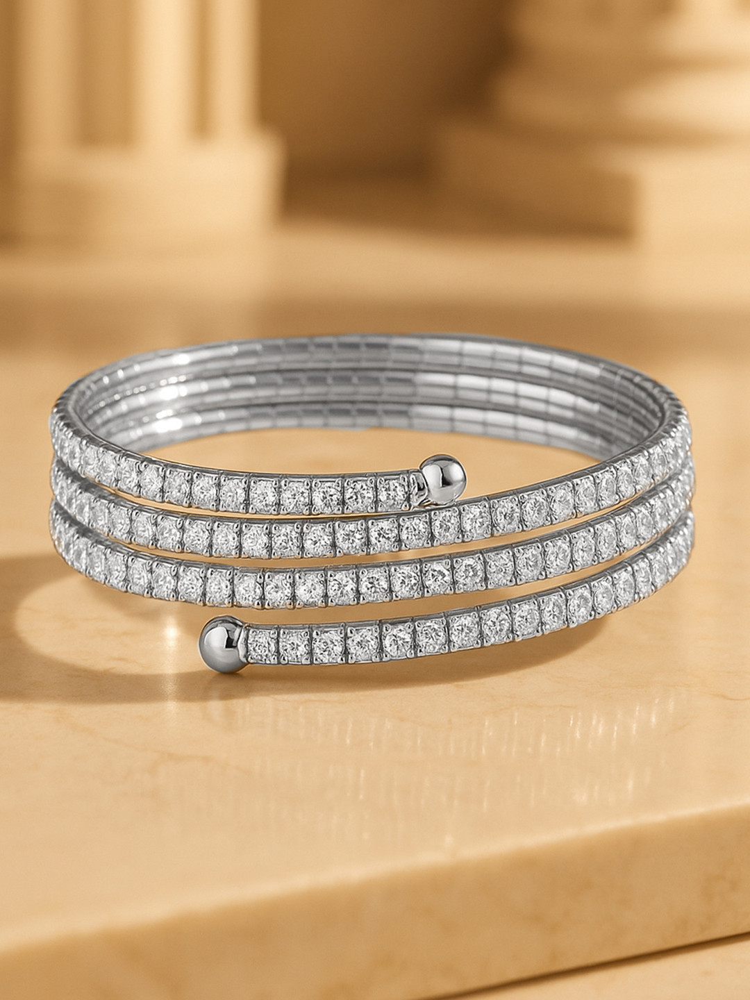 Rubans Rhodium-Plated Cubic Zirconia Studded Triple Line Bangle Style Bracelet