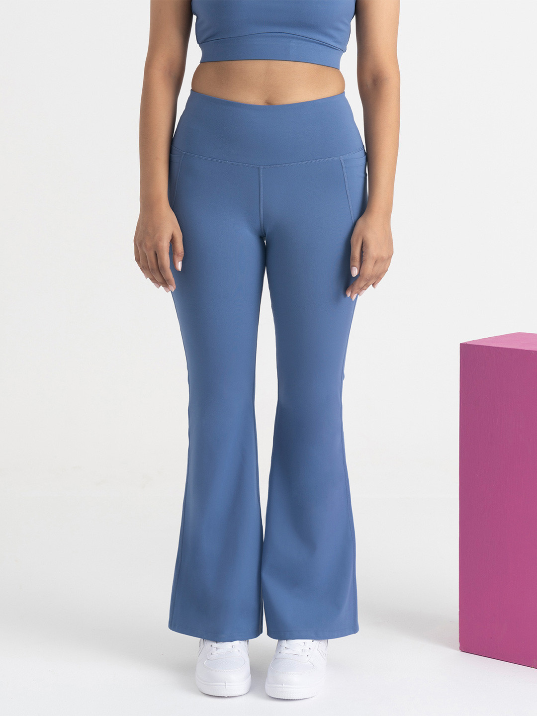 Hunnit Women Zen Regular Fit High Rise Solid Active Wear Flare Pants with Pockets