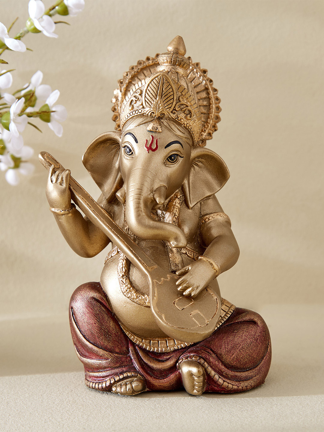 Home Centre Sitting Ganesha with Sitar Gold Polyresin Glossy Prayer Room Small Showpiece - 6.3 Inches