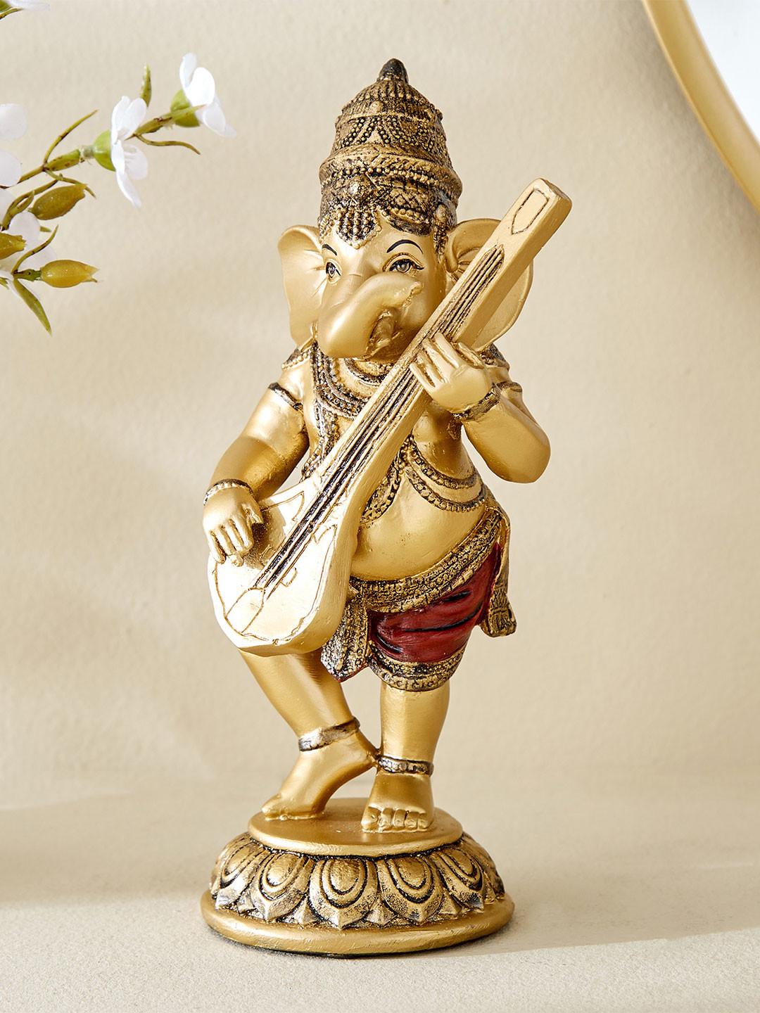 Home Centre Ganesha with Sitar Gold Polyresin Glossy Prayer Room Small Showpiece - 7.5 Inches