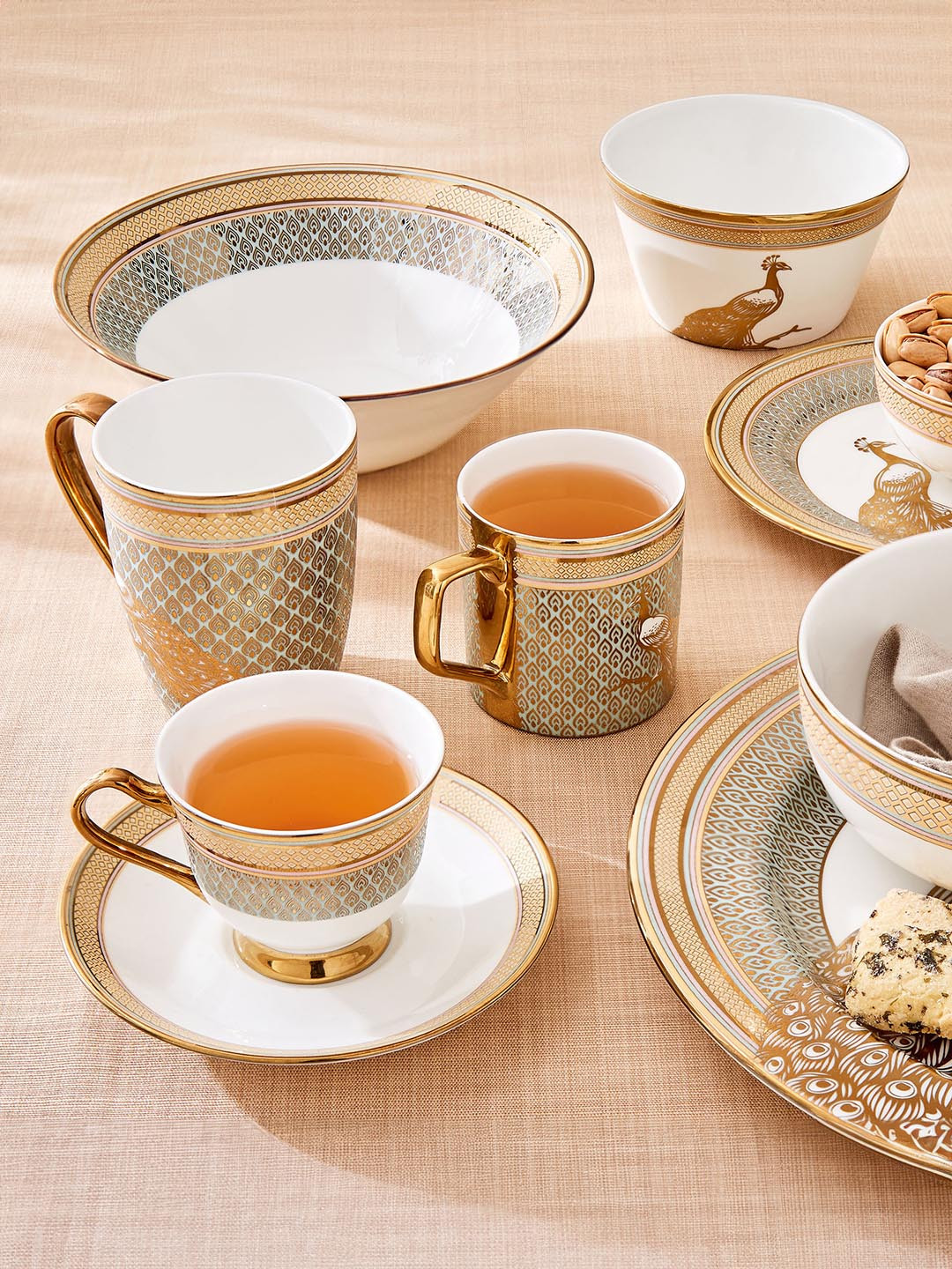 Home Centre Midas Peacock Gold Toned & White Printed Cup And Saucer 150ml