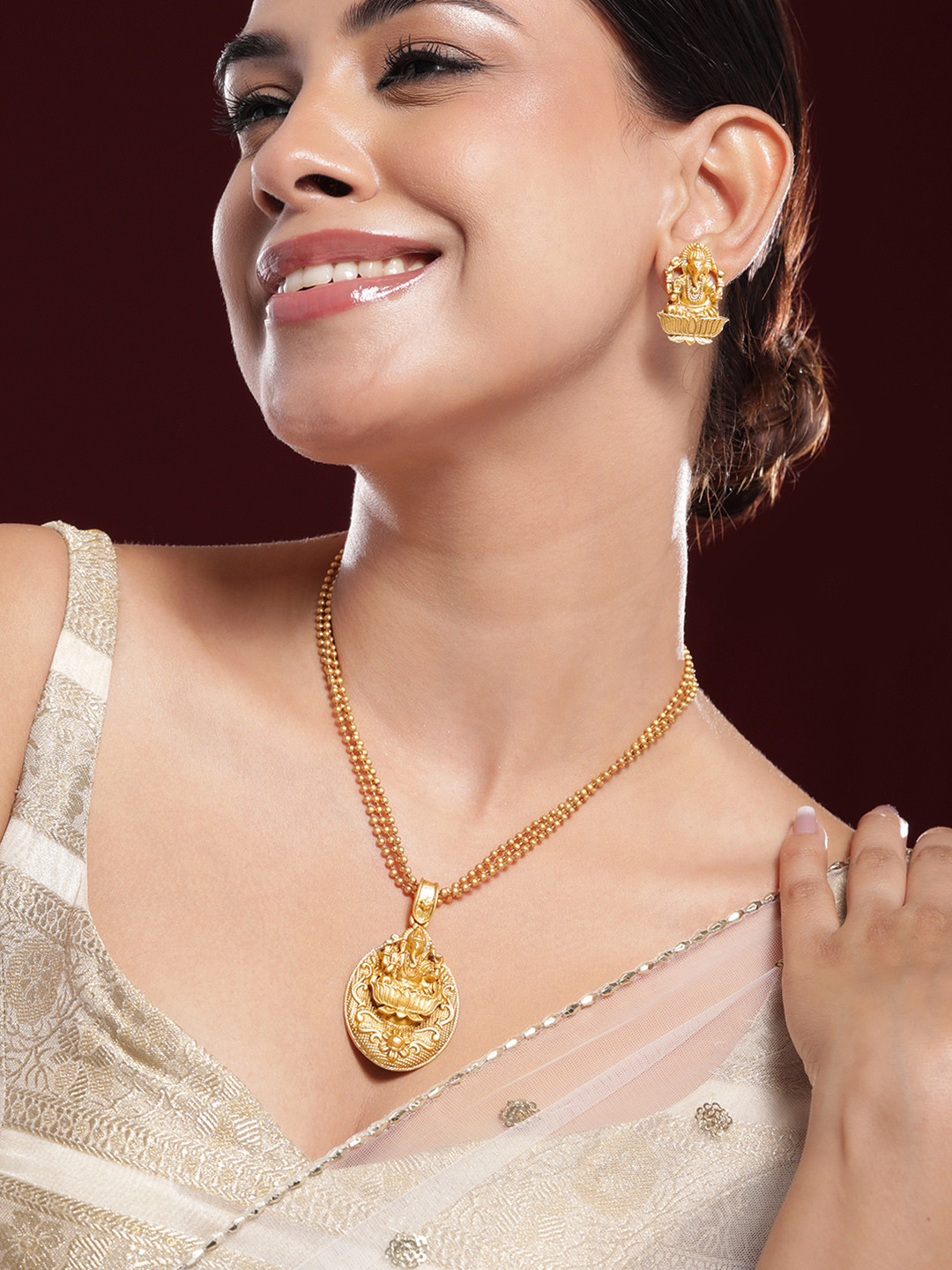 Rubans 22K Gold-Plated Divine Ganesh Motif Necklace Set with Textured Traditional Chain