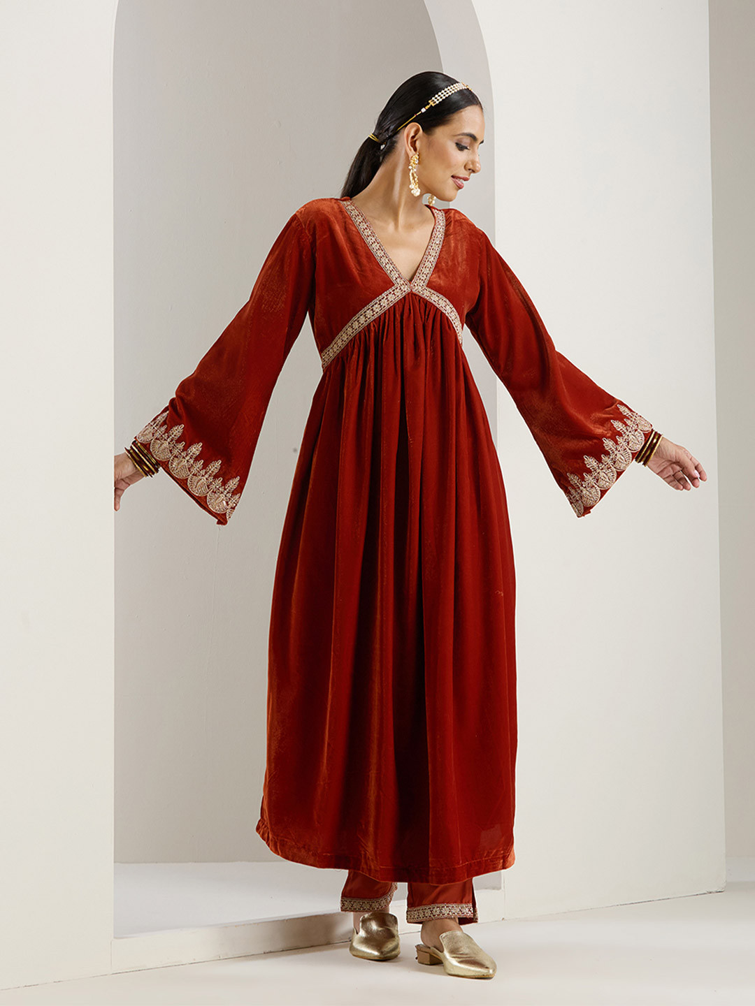 Ishin Rust Ethnic Motifs Embroidered Flared Sleeves Velvet A-Line Kurta With Trousers