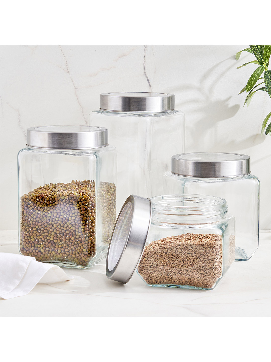 Home Centre Corsica Roven Transparent Glass 4 Piece Screw Top Jar