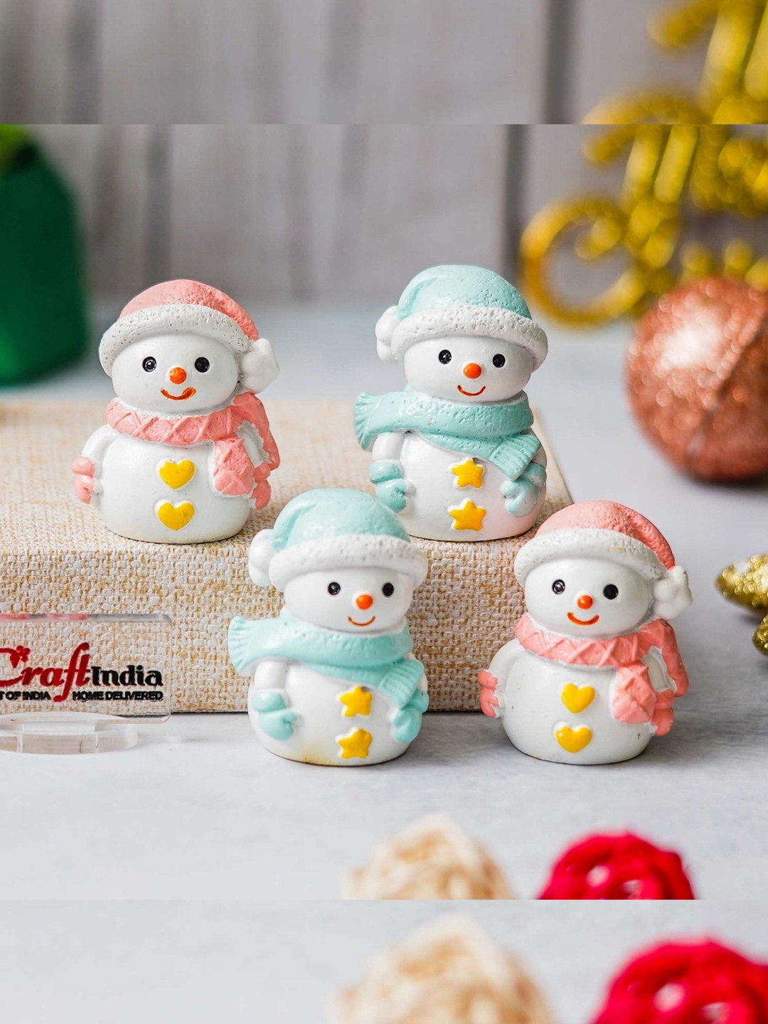 eCraftIndia Blue & Pink Set Of 4 Pieces Snowman Figurine Showpieces