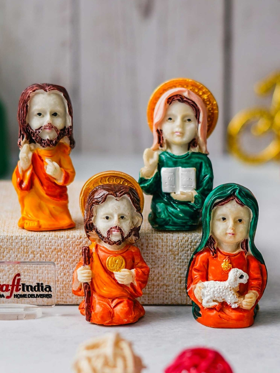 eCraftIndia Jesus Crib Orange Polyresin Matte Prayer Room Set of 4 Tiny Showpieces - 2.4 Inches