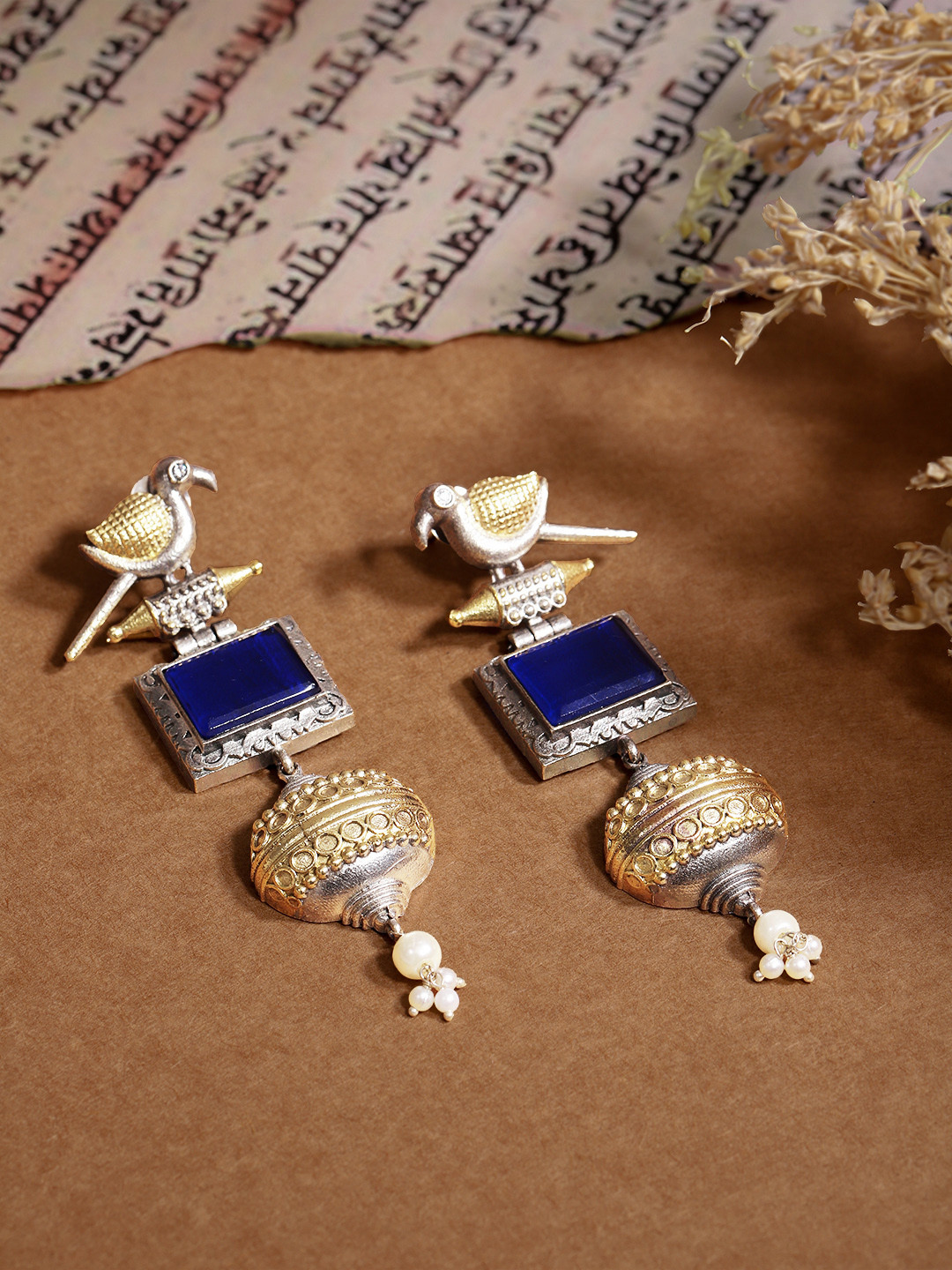 VIVAZS Silver & Gold Dual-Plated Oxidised Long Blue Stone Contemporary Bird Jhumkas