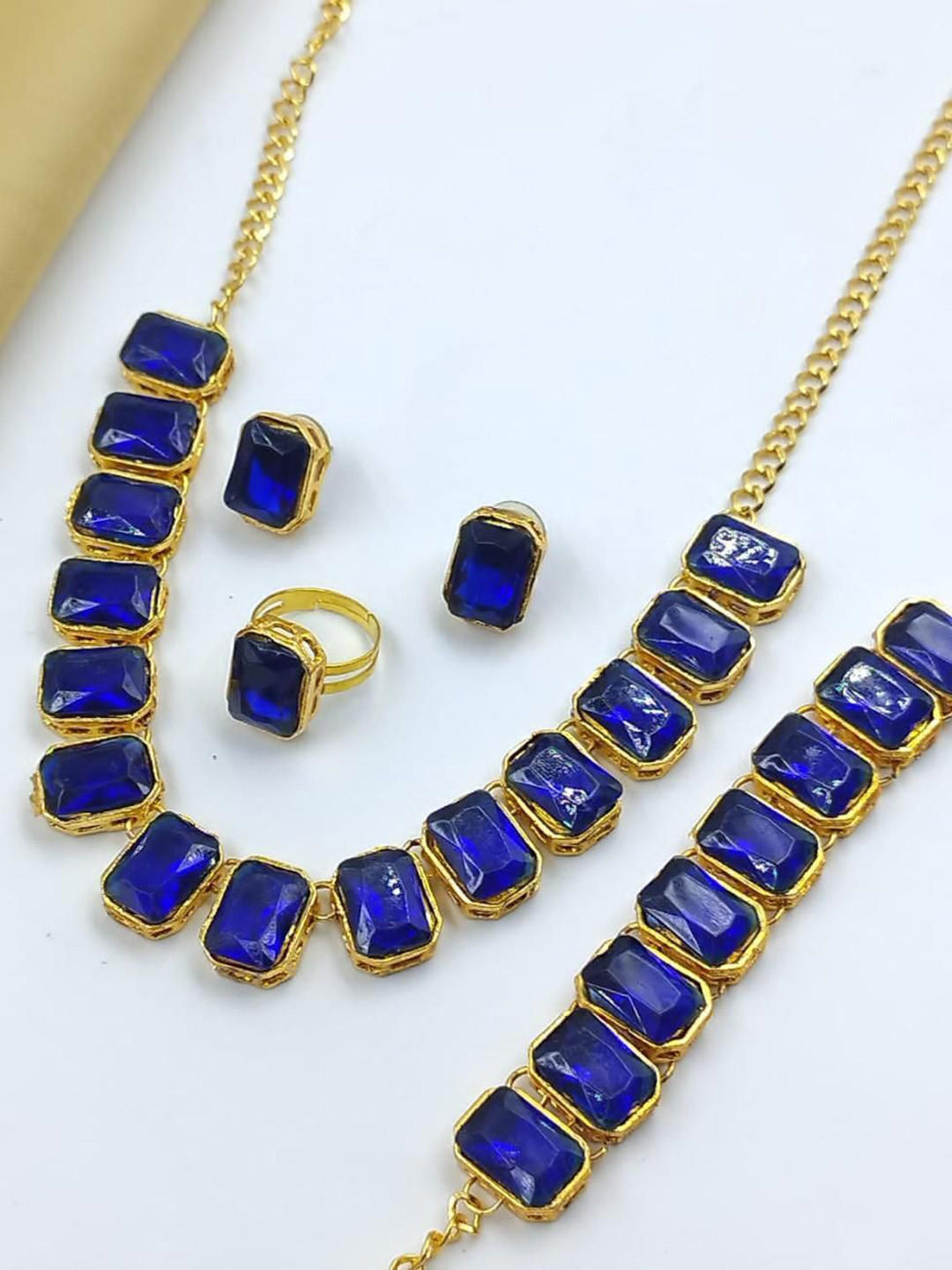 Gyaan Jewels Gold-Plated Stone-Studded Necklace and Earrings With Bracelet Finger Ring