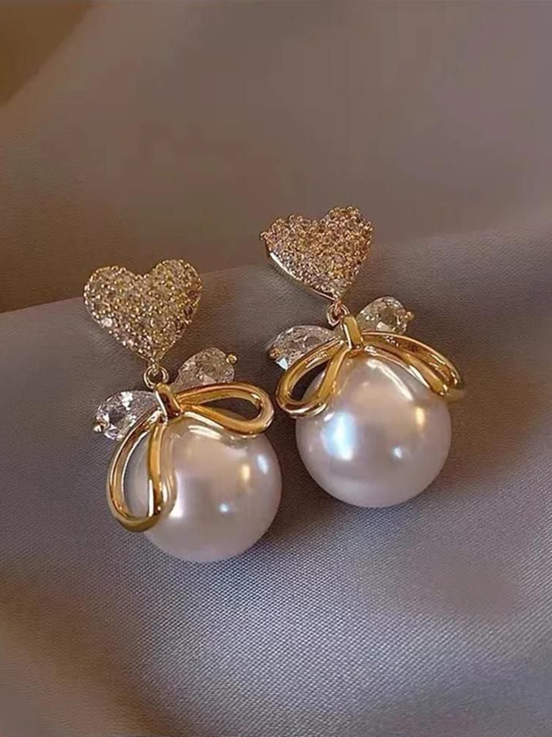 Celestique Gold-Plated Bow Heart Shaped Stone Studded & Pearl Beaded Drop Earrings