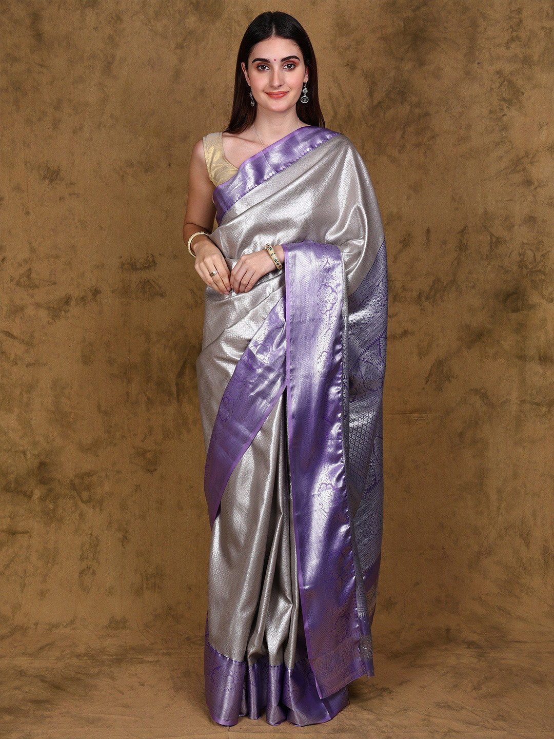 Exotic India Oyster Gray Saree with Woven Motifs in Silver Colored Thread