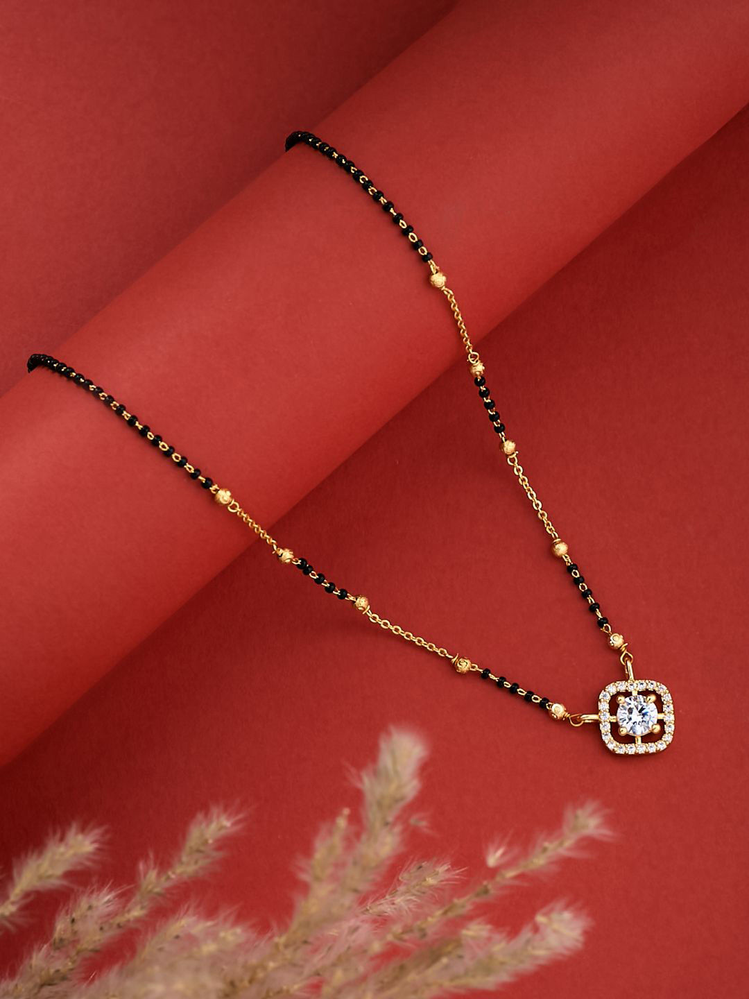ATIBELLE Gold-Plated Cubic Zirconia Stone Studded & Beaded Round Shaped Mangalsutra