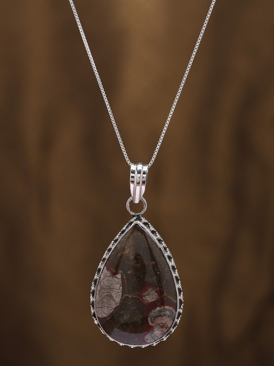 Exotic India Sterling Silver Pendant with Teardrop Shaped Mushroom Jasper