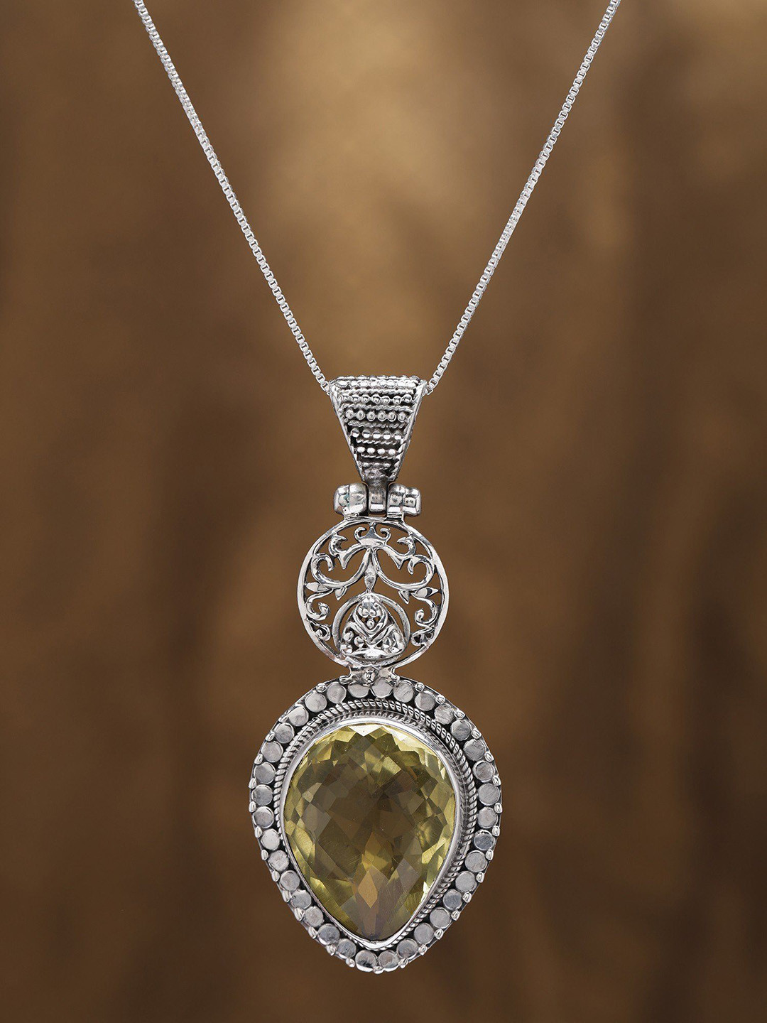 Exotic India Designer Sterling Silver Pendant with Inverted Tear Drop Lemon Quartz Stone