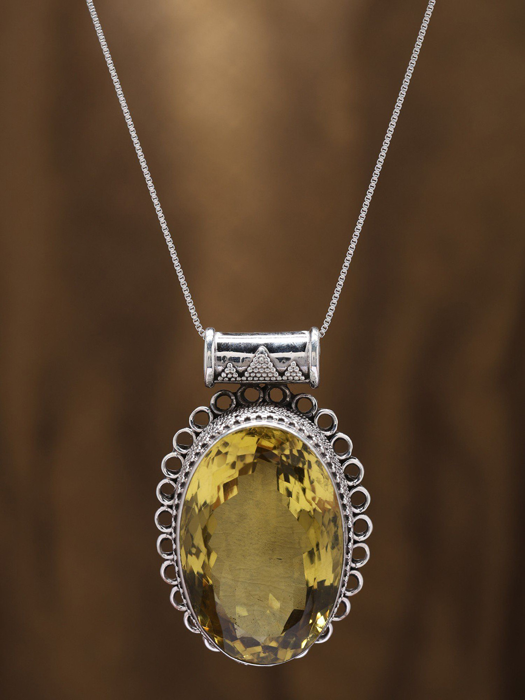 Exotic India Sterling Silver Rawa work Pendant with Oval Lemon Quartz Gemstone
