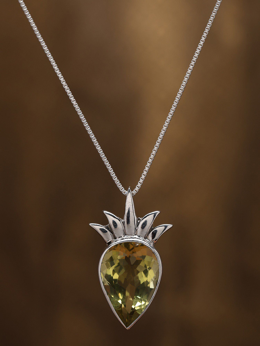Exotic India Sterling Silver Pendant with Inverted Tear Drop Lemon Quartz