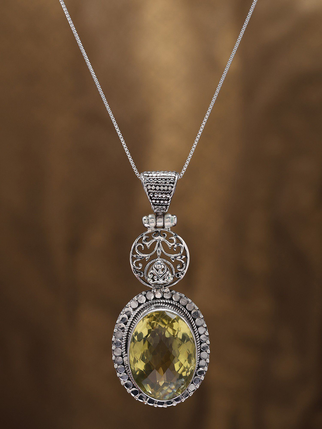 Exotic India Faceted Oval Shape Lemon Quartz Pendant in Sterling Silver