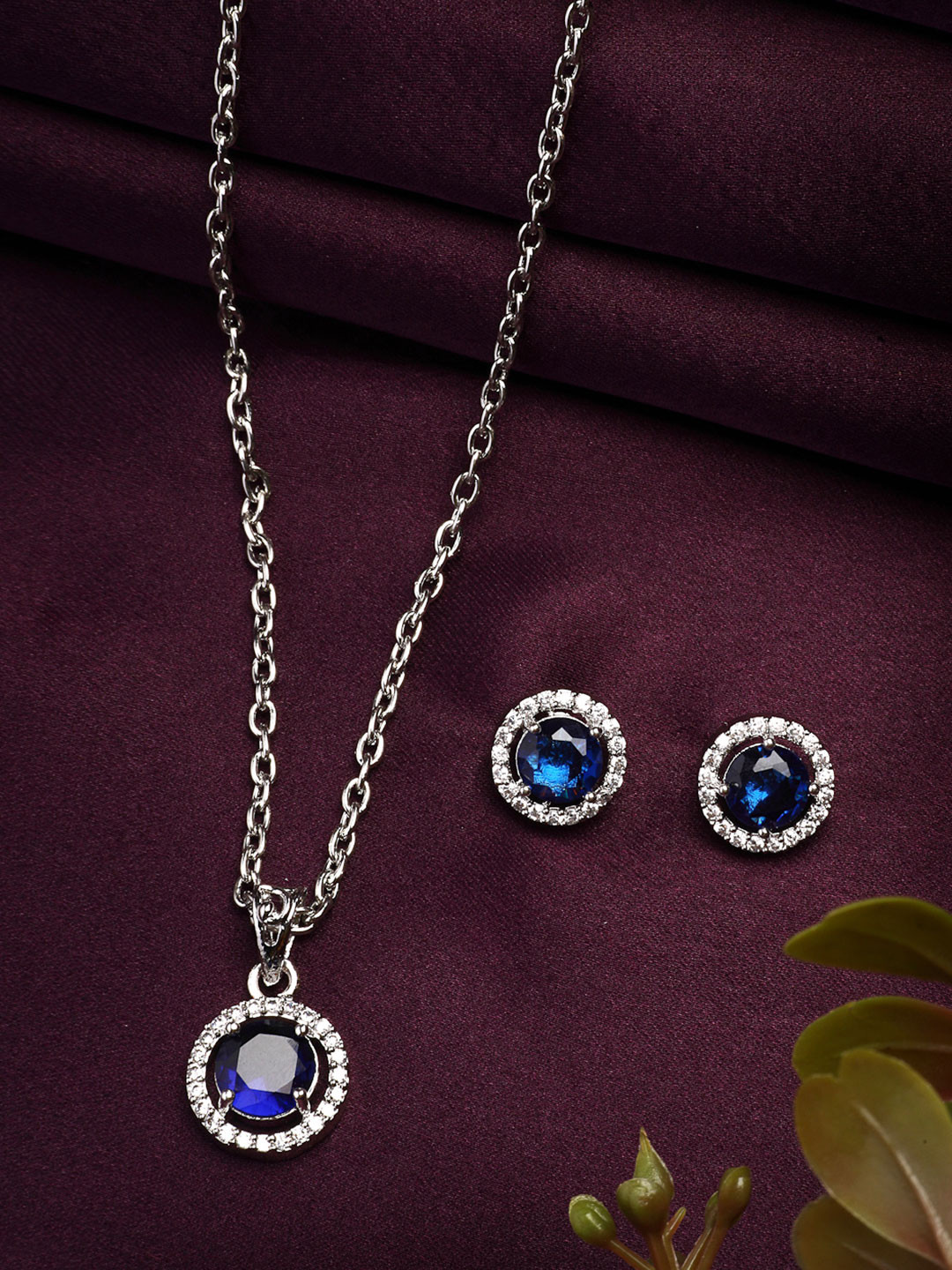 ZENEME Rhodium Plated Silver Toned AD Studded Blue Round Pendant with Earrings Set