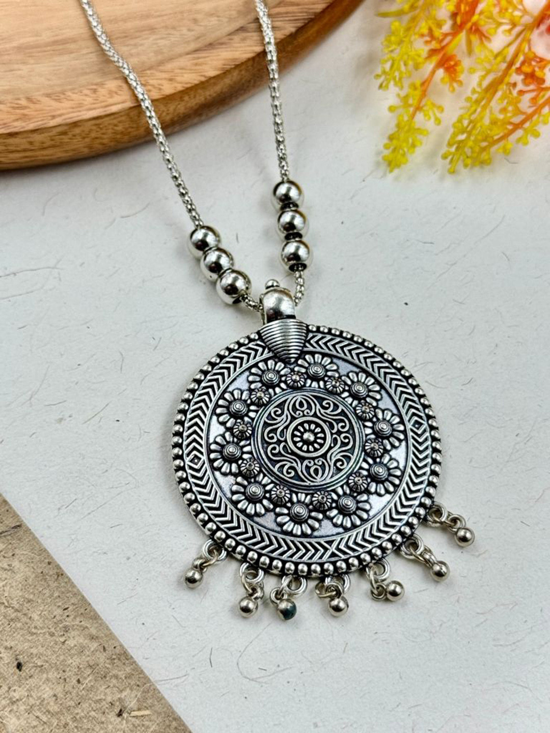 NAMAN ARTS Silver-Plated Circular Shaped Designer Pendant