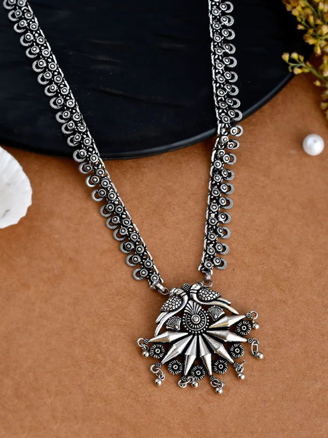 NAMAN ARTS Silver-Plated Oxidised Spring Chain Pendant Statement Necklace