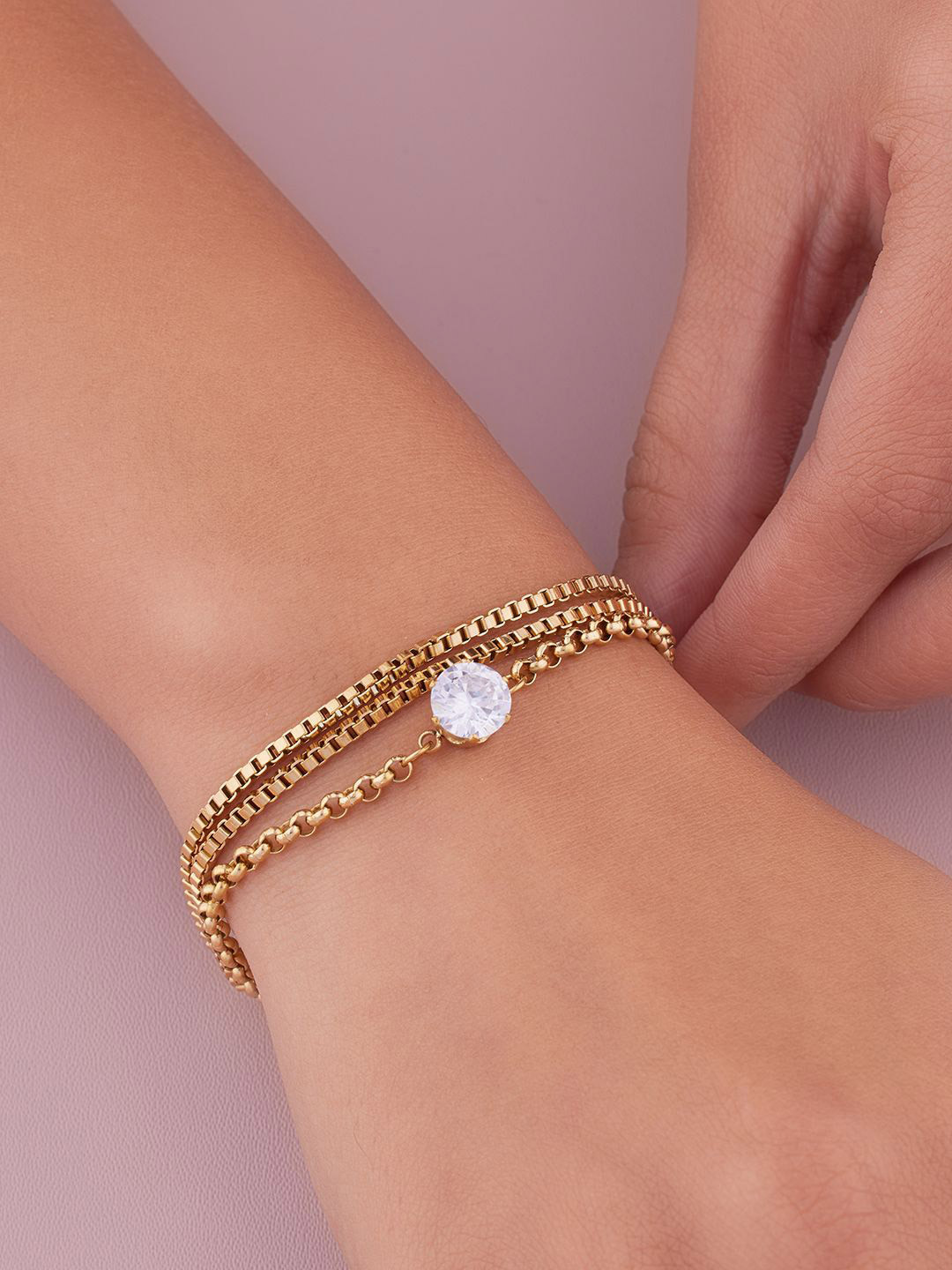 ANJNI CREATION Gold-Plated AD Studded Stainless Steel Tarnish-Free Soliter Link Bracelet