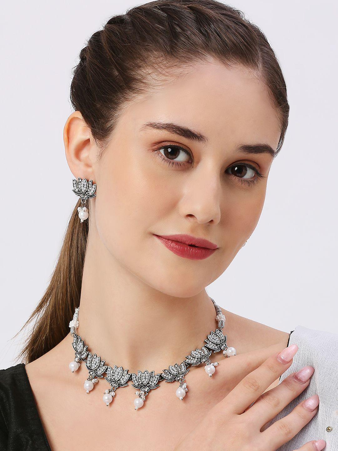 OOMPH Artificial Stones Pearls Studded & Beaded Oxidized Loutus Jewellery Set