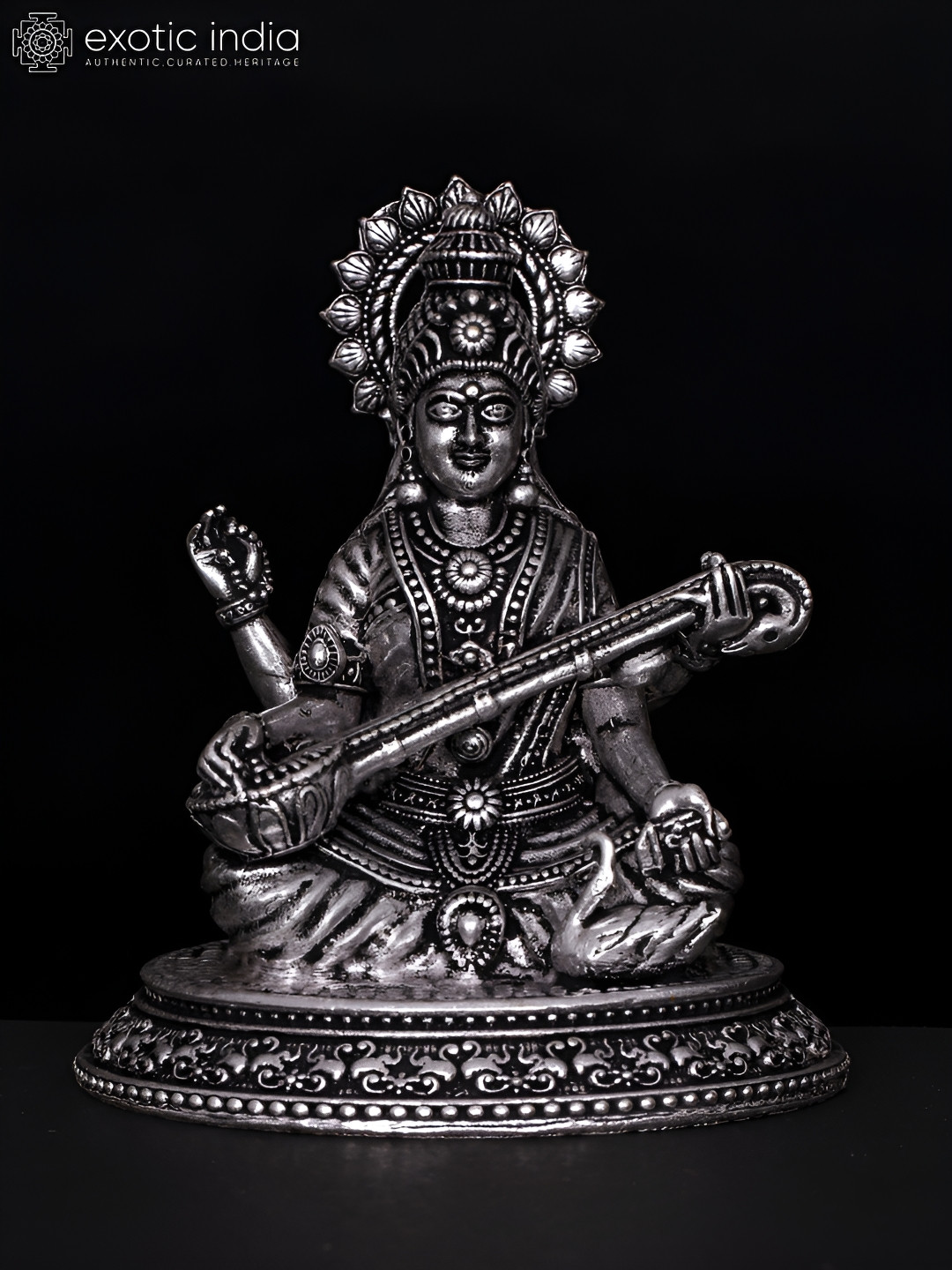 Exotic India Four Armed Goddess Saraswati Silver Brass Metallic Prayer Room Tiny Showpiece - 3.5 Inches