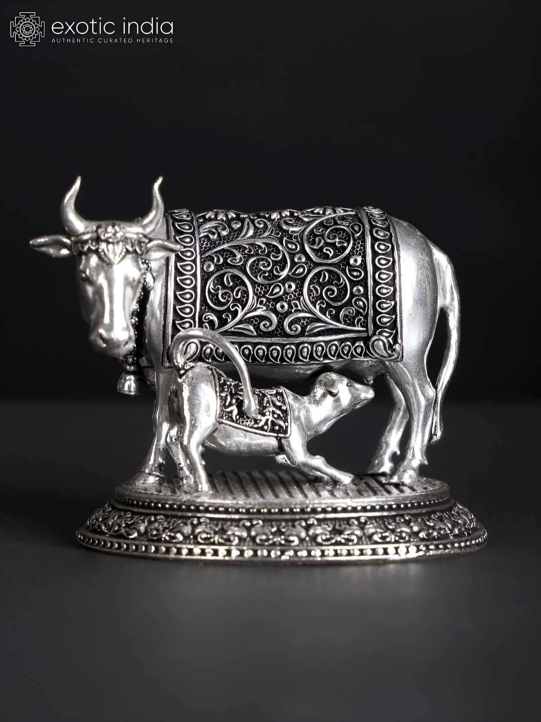 Exotic India Cow and Calf Silver Brass Metallic Living Room Tiny Showpiece - 2.3 Inches