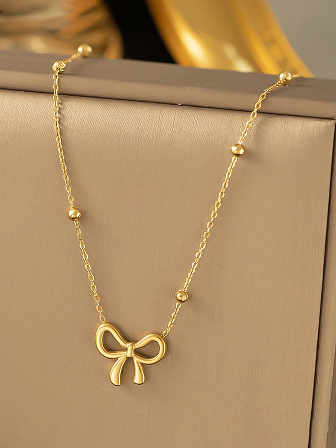Designs & You Gold-Plated Bow Necklace