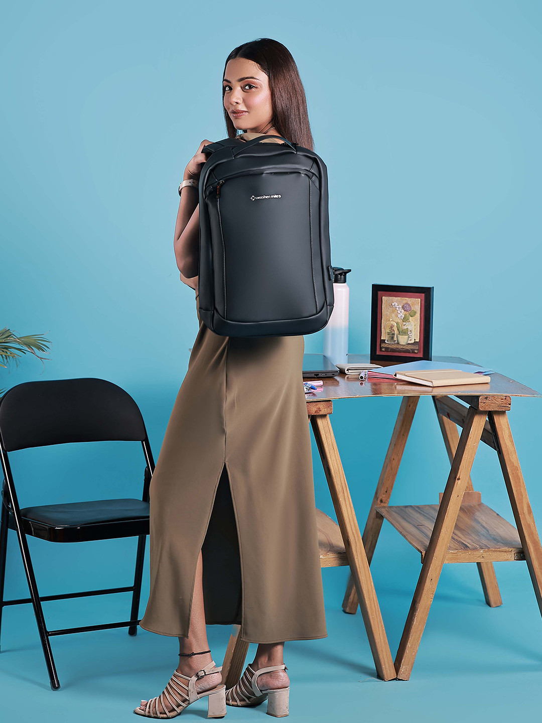 Nasher Miles Queens 22L Polyester Black Laptop Backpack with USB charging port