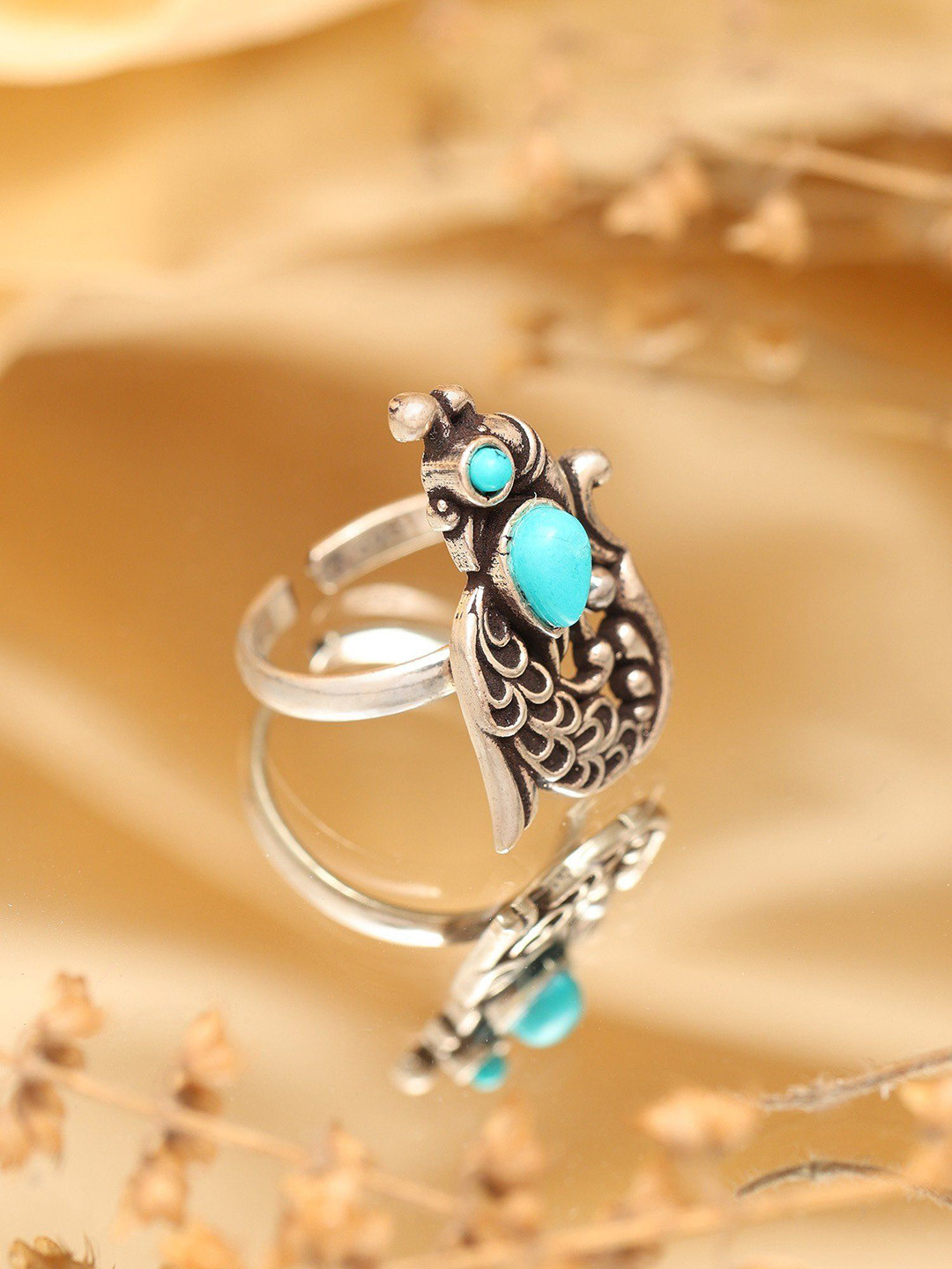 Exotic India Sterling Silver Adjustable Peacock Design Ring with Tibetan Turquoise