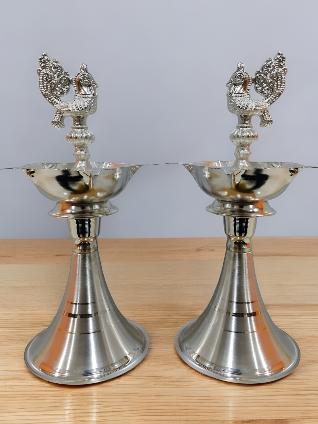 Sigaram Silver-Toned Textured Pure German Silver Peacock Diyas