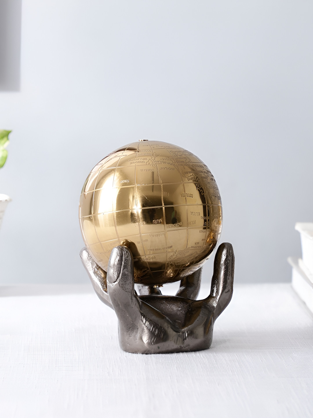 Decor de Maison Celestial Black & Gold Toned Globe With Hand Showpiece