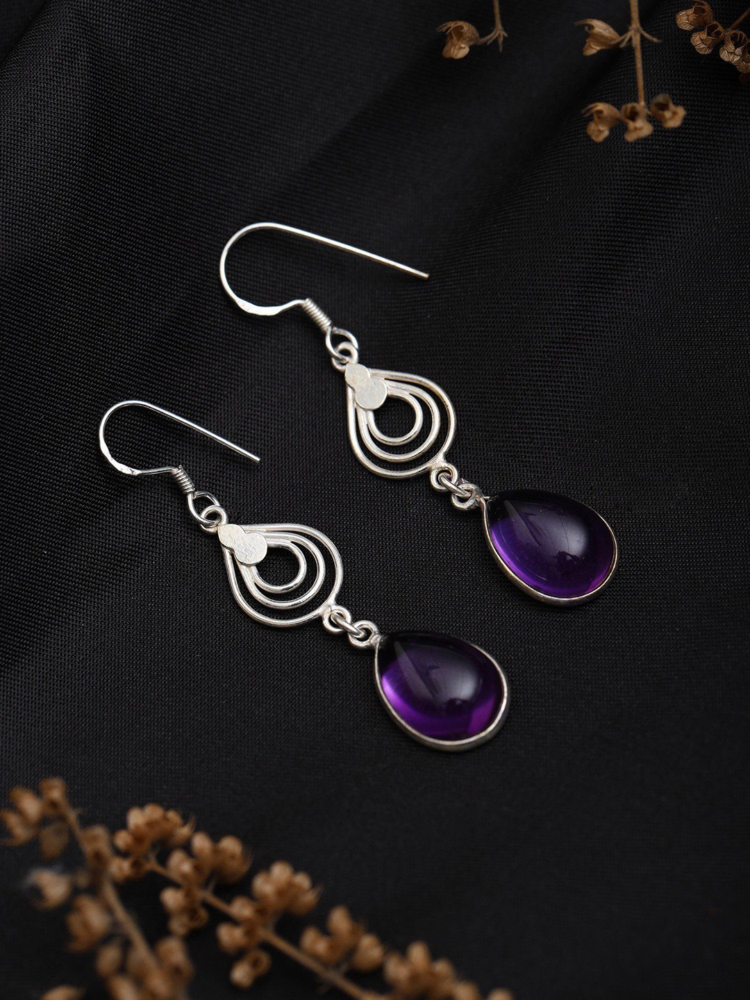 Exotic India Sterling Silver Earrings with Tear Drop Amethyst