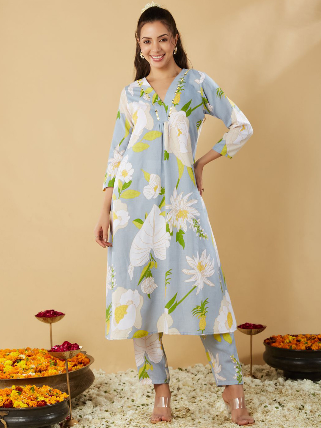 MOKOSH Floral Printed Pleated V-Neck Mirror Work A-Line Kurta With Trousers