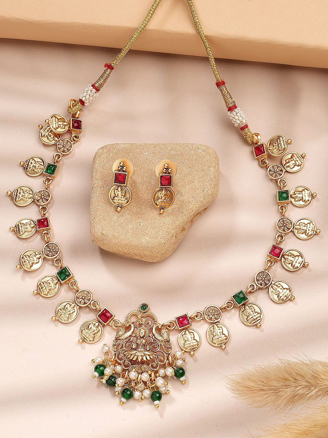 KARATCART Gold-Plated Stone Studded Engraved Coin Design Laxmi Mata Necklace and Earrings