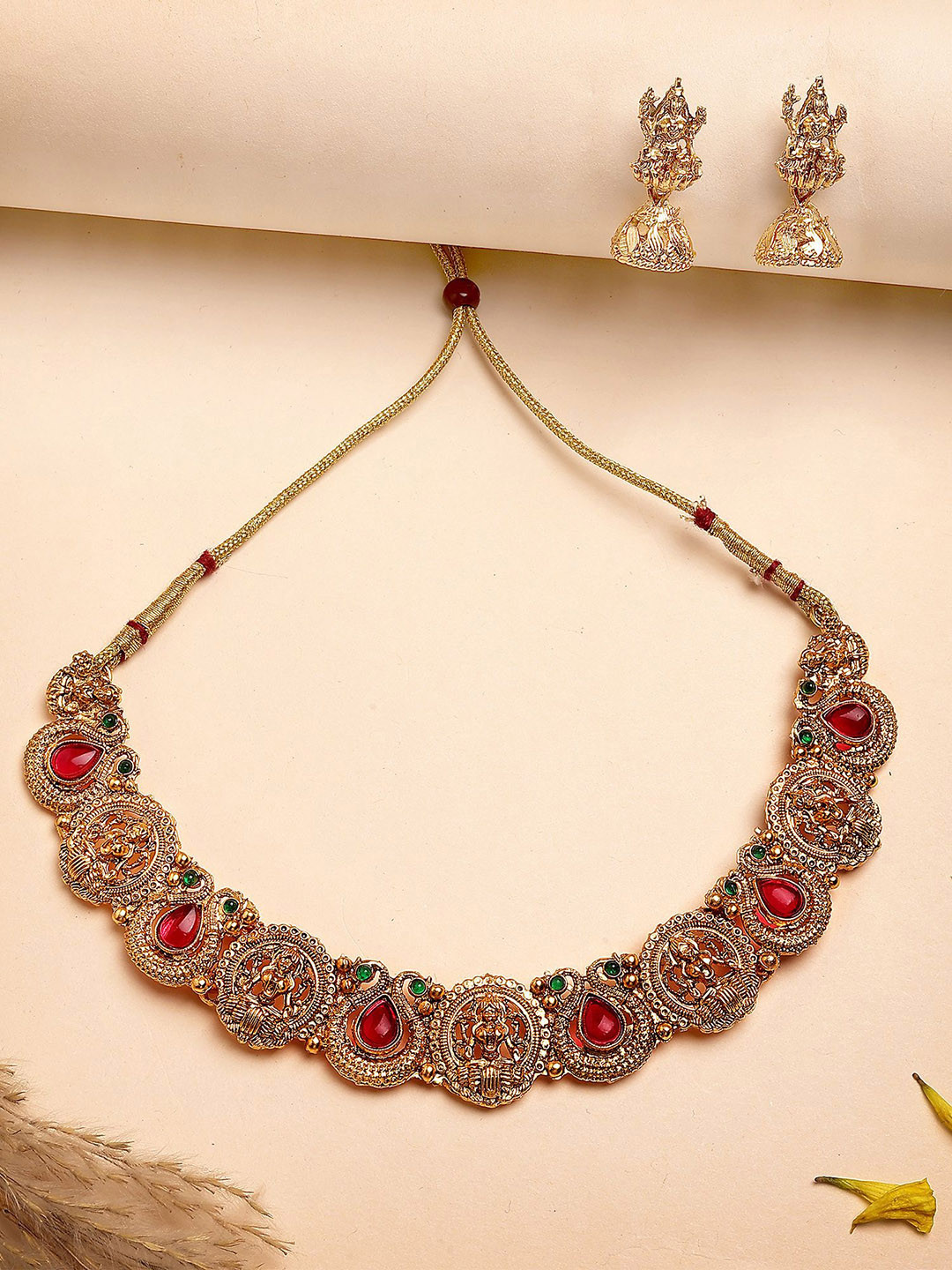 KARATCART Gold-Plated Kundan Studded Laxmi Mata Necklace and Earrings