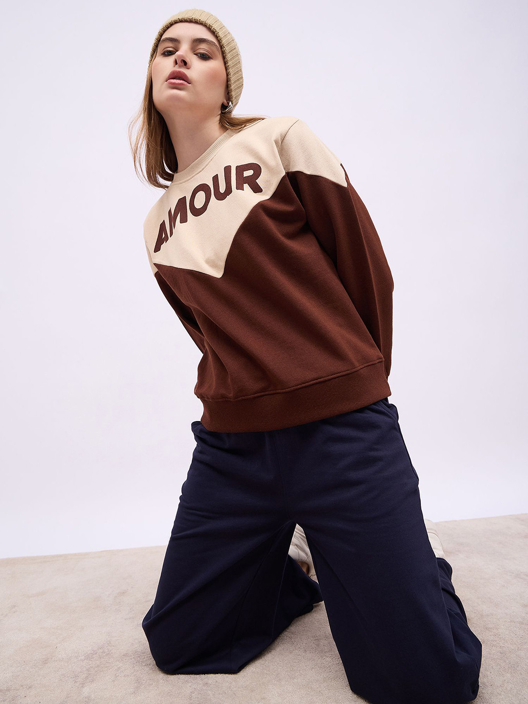 Styli Women Regular Fit Colourblocked  Chest Printed Casual Pullover Sweatshirt