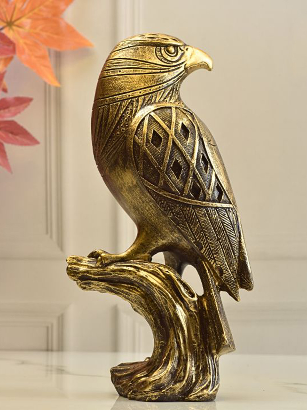 The Gharnish The Majestic Garuda Gold Polyresin Glossy Living Room Small Showpiece - 11 Inches