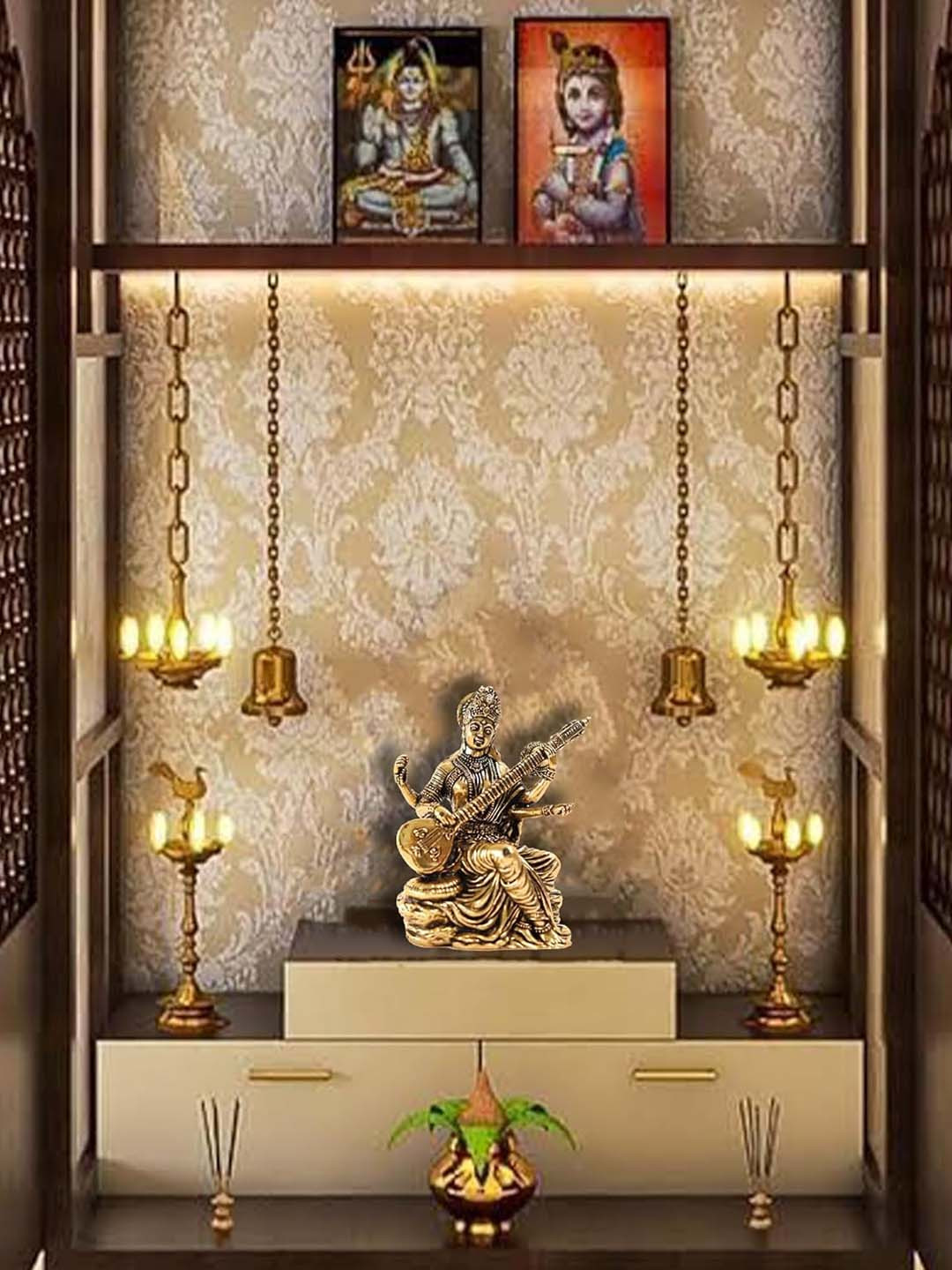 The Spiritual Living Saraswati Ji Gold Brass Metallic Prayer Room Small Showpiece - 3 Inches