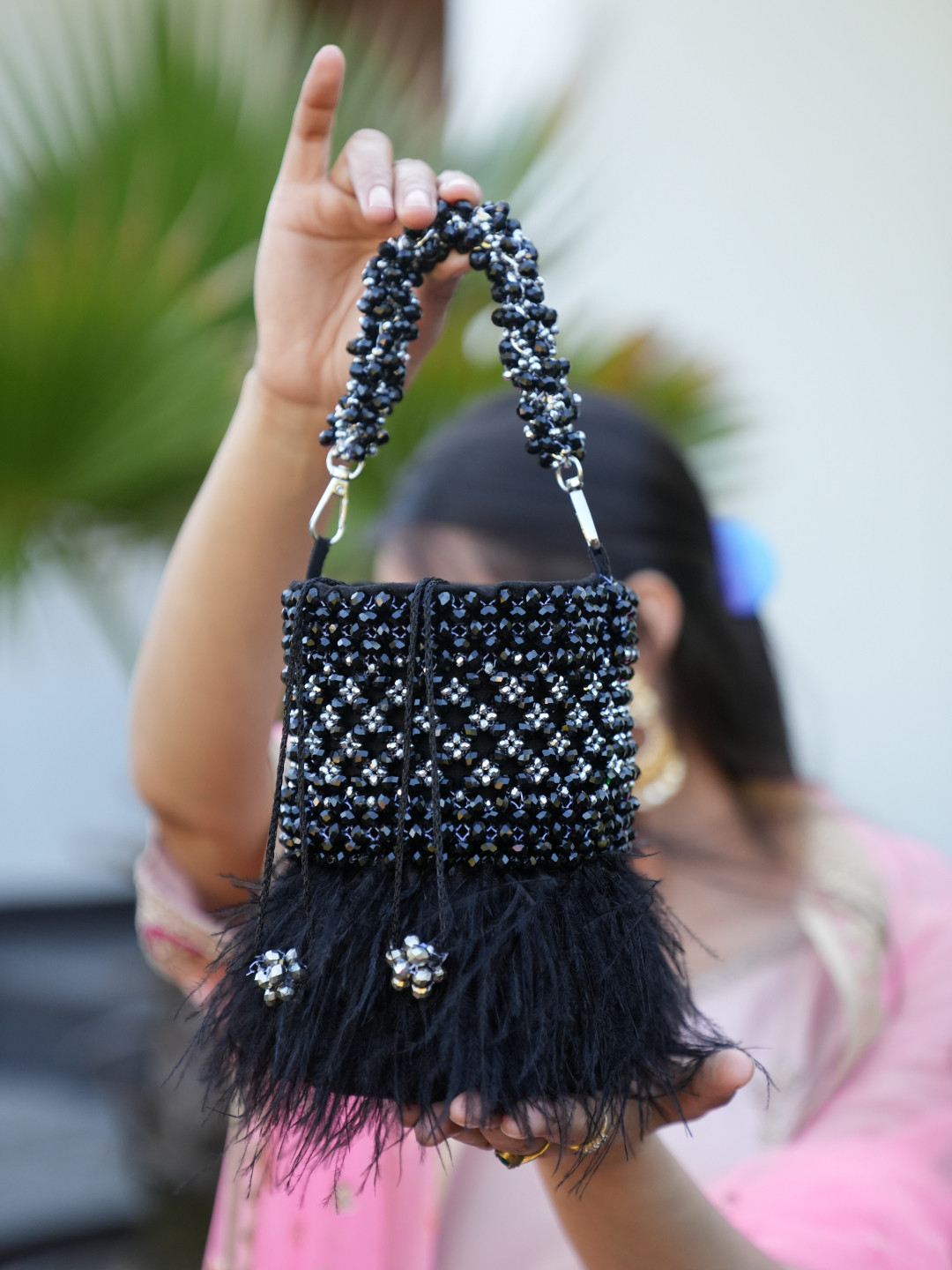 Chiaro Women premium Embellished Potli Clutch With Feather bag