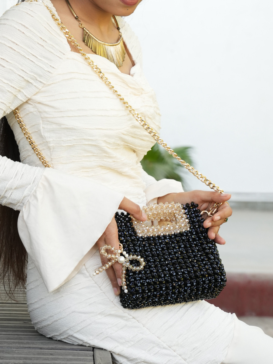 Chiaro Women Bow Embellished clutch With Cut Out Handle