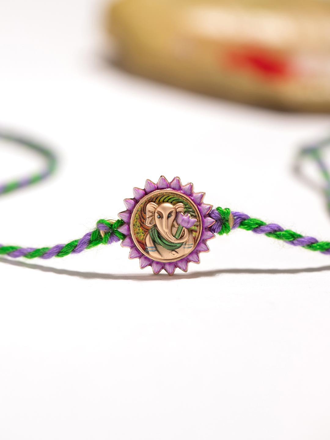 Voylla Vibrant Ganesha Enameled Thread Rakhi With Roli Chawal