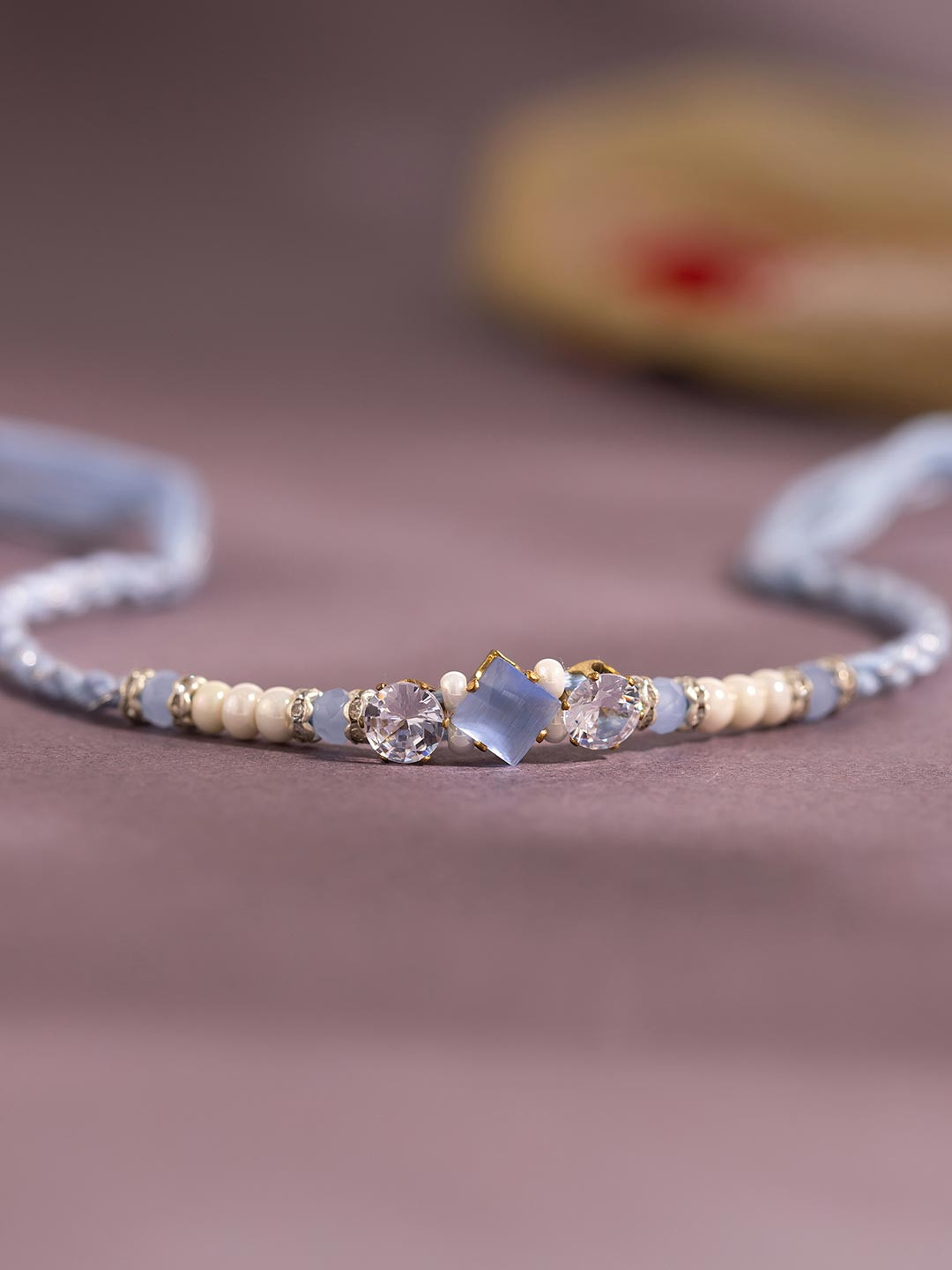 Voylla Glimmering Pastel American Diamond Studded Thread Rakhi