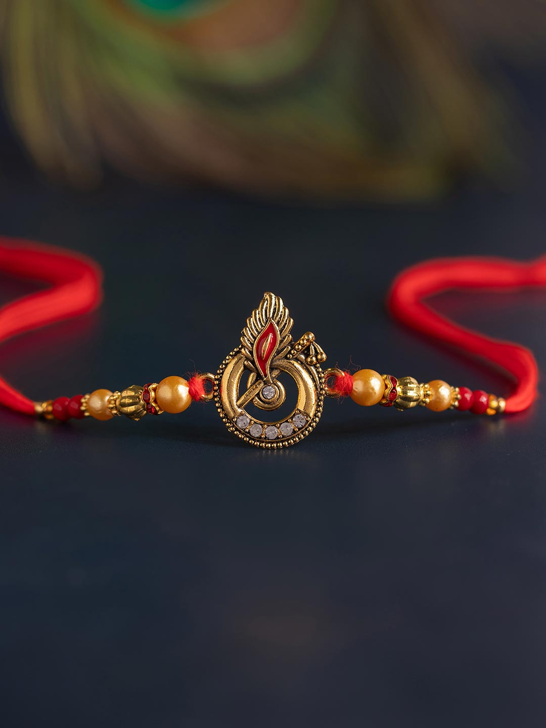 Voylla Krishnas Grace Mor Pankh Beaded Thread Rakhi With Roli Chawal