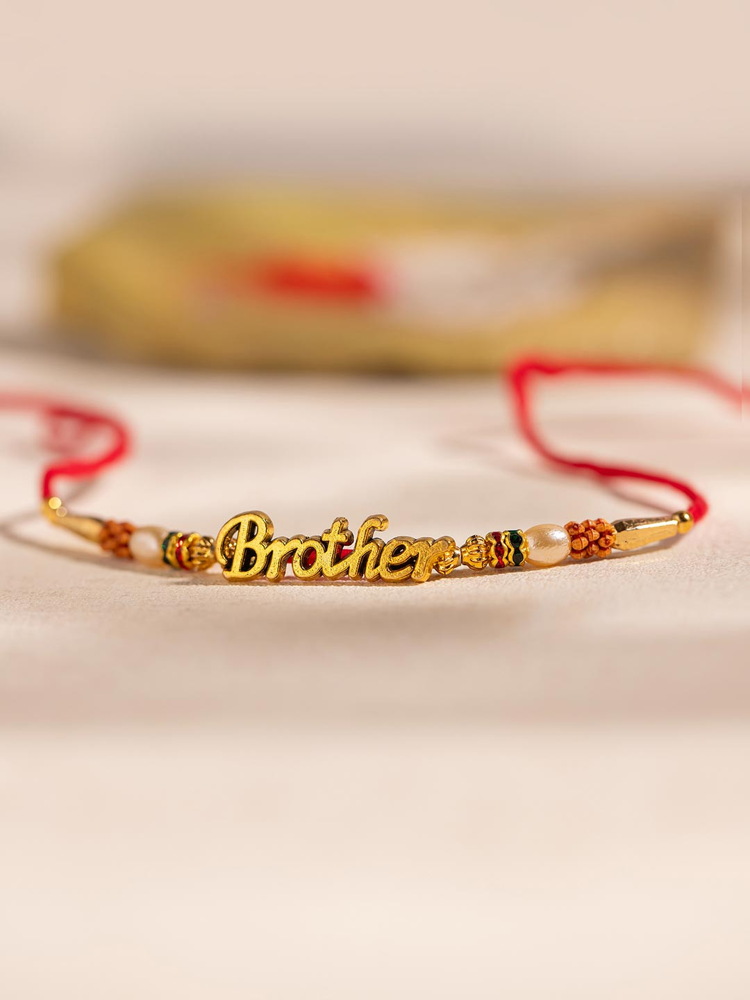 Voylla Brother's Treasure Beaded Thread Rakhi With Roli Chawal